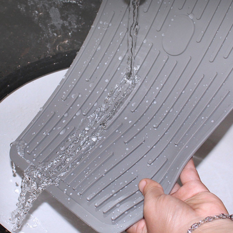 Ορθογώνιο κουμπί για να κρατάτε το τακάκι αποστράγγισης