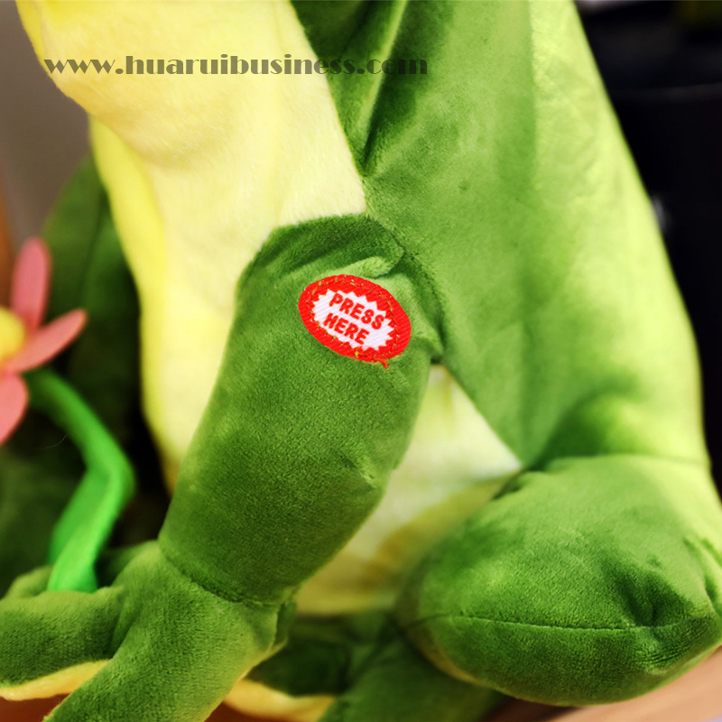 Βάτραχος με ηλεκτρικό διακόπτη, με βελούδο γάλακτος, μπορεί να κουνήσει το σώμα του και να κλείσει τα μάτια του.